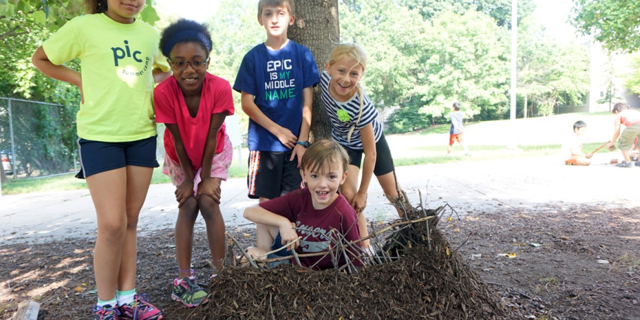 PIC campers create a structure from natural materials